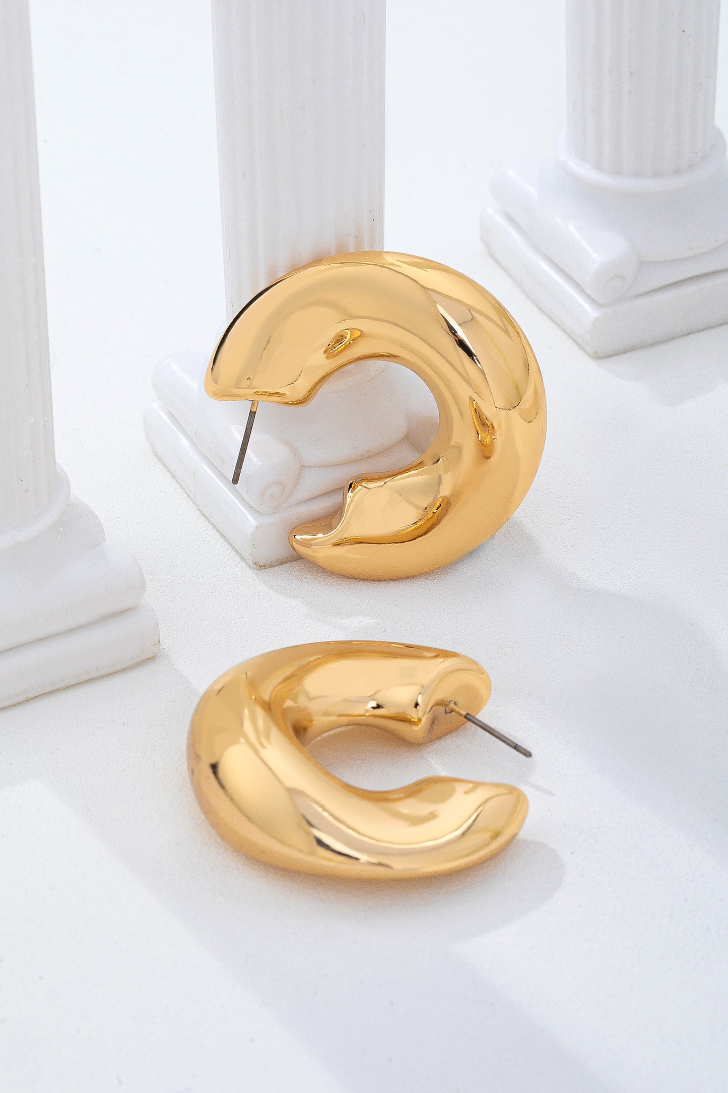 BOLD GOLD-TONE CHUCKY DOME CRESCENT HOOP EARRING